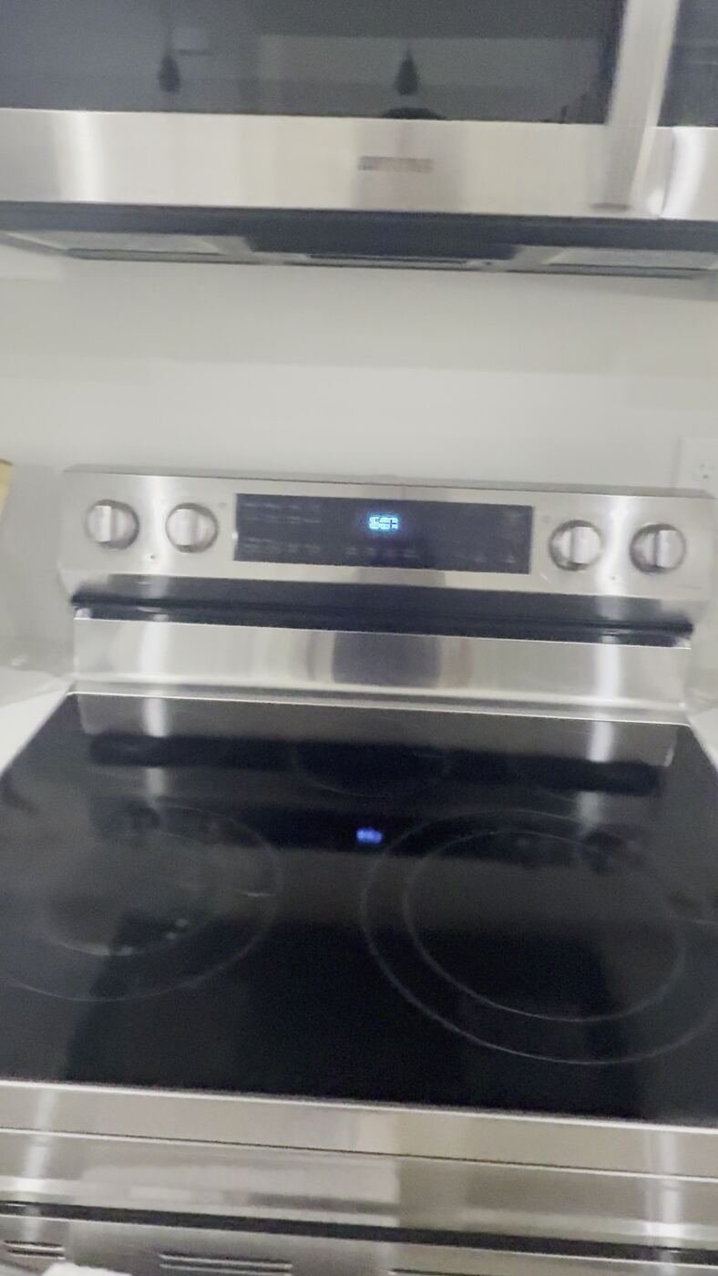 Custom range and stone backsplash detail